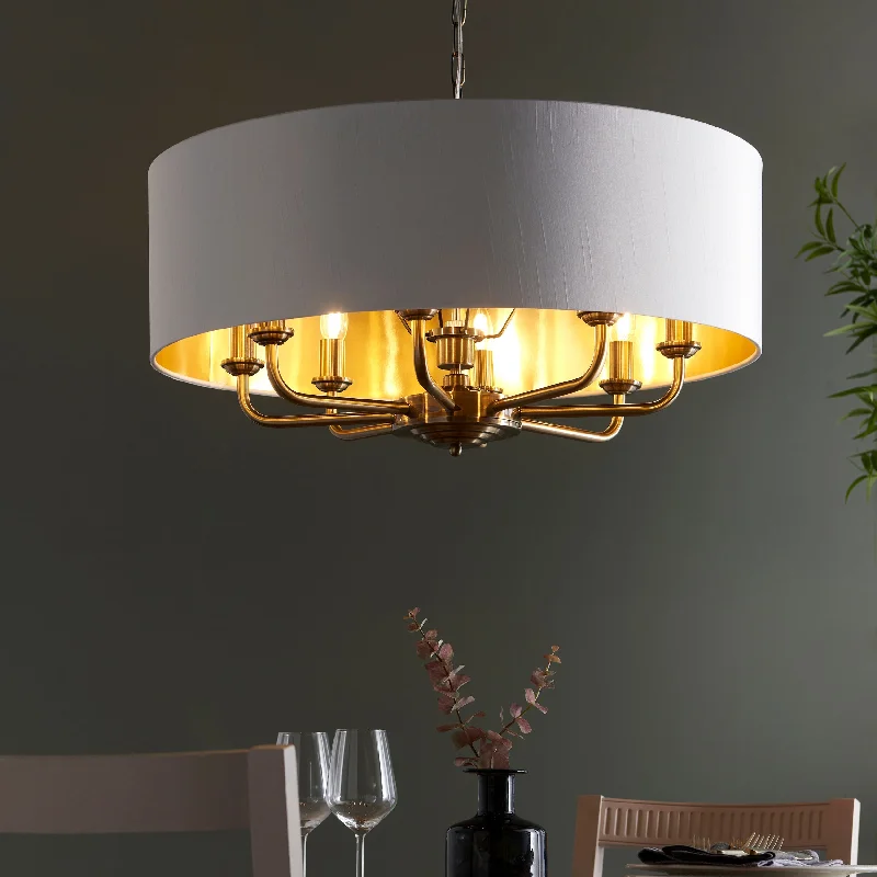 Minimalist Chandeliers for Sleek and Simple InteriorsMinimalist Chandeliers for Sleek and Simple InteriorsEndon Highclere 8lt Pendant Antique Brass & White