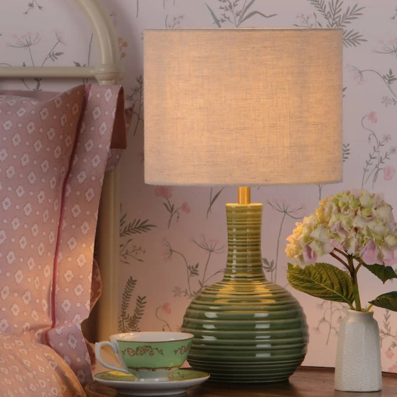 fabric table lamps with a linen shade for a relaxed and breathable lookfabric table lamps with a linen shade for a relaxed and breathable lookLaura Ashley Padley Green Table Lamp with shade